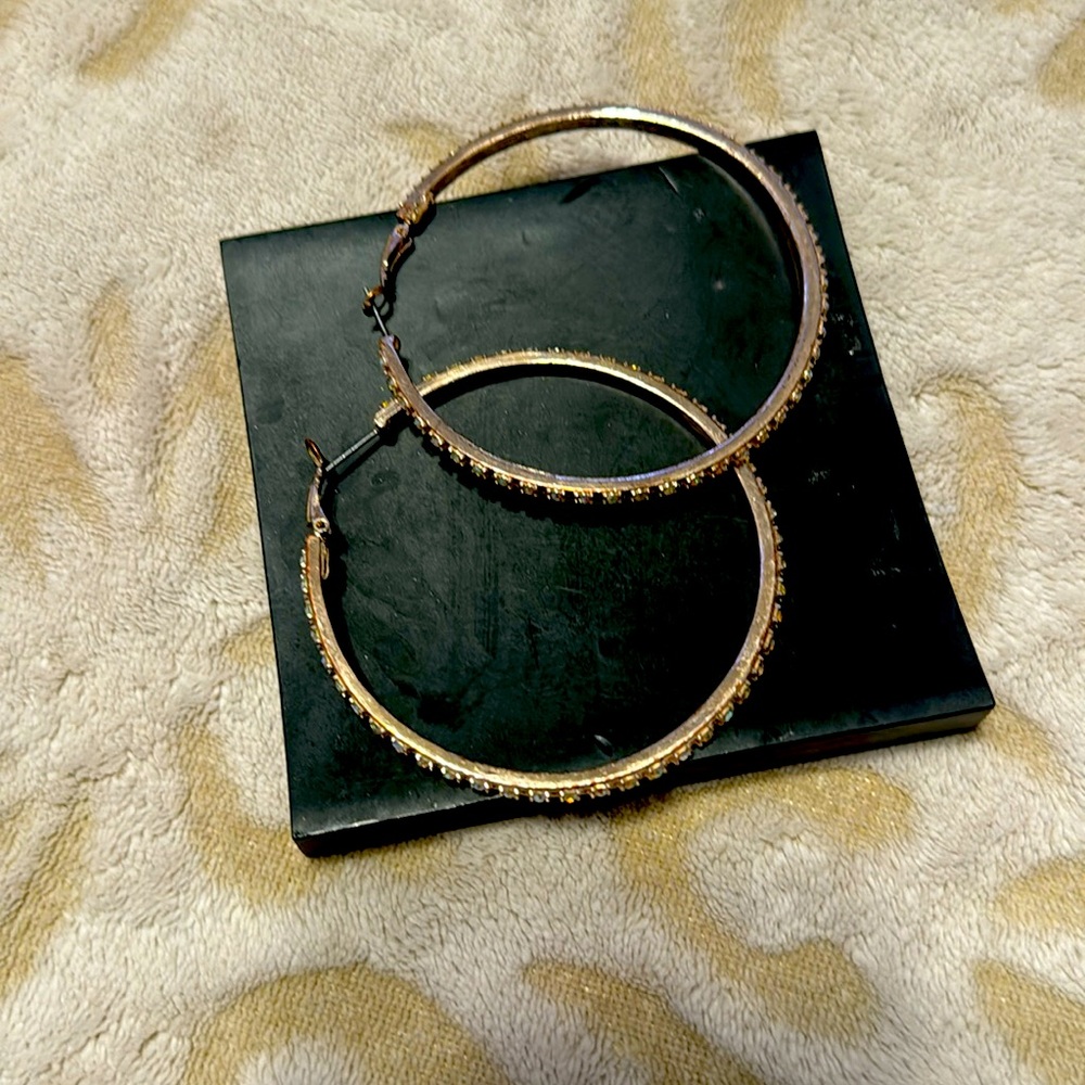 Rose color hoop earring with the rhinestones from fashion nova